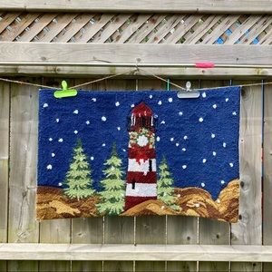 Hand hooked Christmas accent rug.